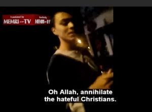 Eine Sequenz aus dem Video, in dem der Sohn von des "Hasspredigers" Amaouch in Verviers singend Allah zur Tötung aller "verhassten Christen" aufruft. Foto: Screenshot - Memri.fr
